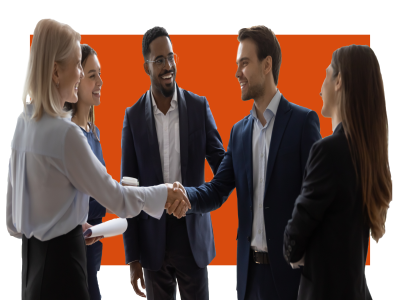 People shaking hands in front of others