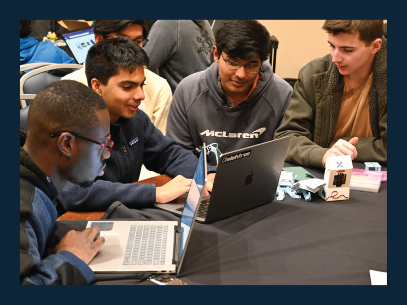 Students sitting around a table working together