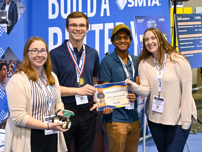 Students holding certificate