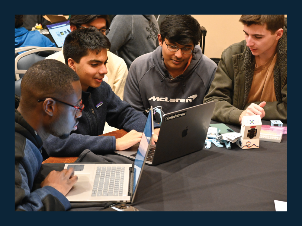 Students sitting around a table working together
